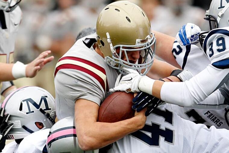 Haverford's Dox Aitken is gang tackled by a host of Malvern Prep players. (Ron Cortes/Staff Photographer)