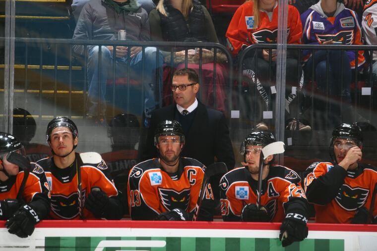 Phantoms coach Scott Gordon behind the bench.