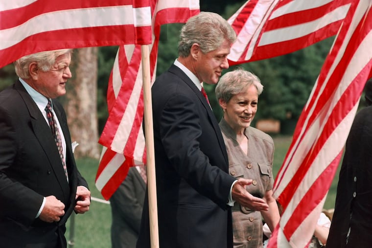 President Bill Clinton, flanked by Sen. Nancy Kassebaum (R., Kan.) and Sen. Edward Kennedy (D., Mass.), arrives on the South Lawn of the White House, Aug. 21, 1996, prior to signing the Health Insurance Portability and Accountability Act. Kassebaum died Friday at 94.