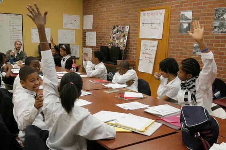 Students participate in a seventh-grade class at Eastern University Academy Charter School in November 2009.