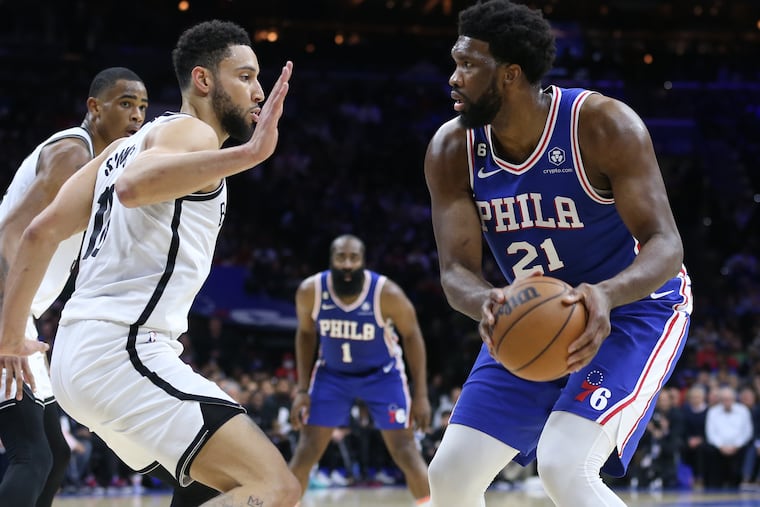 Joel Embiid (right) and Ben Simmons square off during the first half on Wednesday. It was Embiid's and Simmons' first time facing each other.