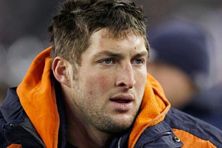 Tim Tebow and the Broncos fell to the Patriots, 45-10, in their AFC playoff game on Saturday. (Charles Krupa/AP)