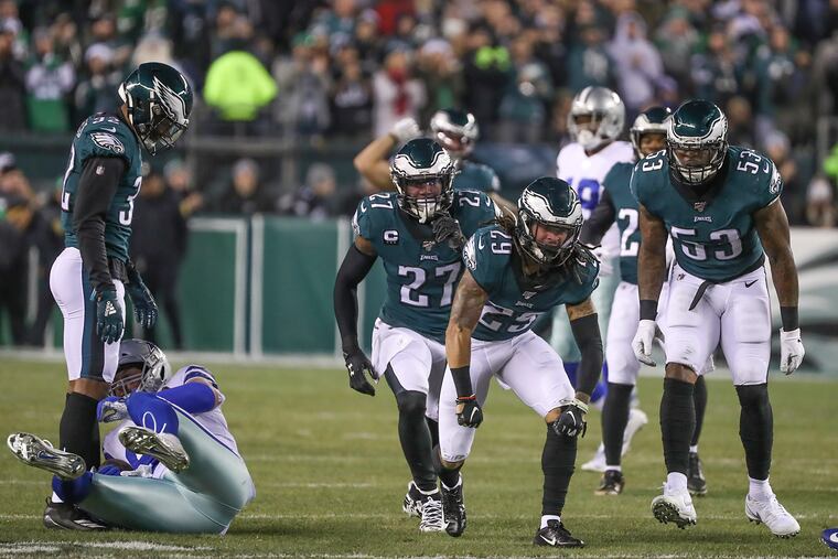 Eagles cornerback Avonte Maddox celebrates after bringing down Dallas Cowboys tight end Jason Witten in the first half of a game at Lincoln Financial Field in South Philadelphia on Sunday, Dec. 22, 2019.
