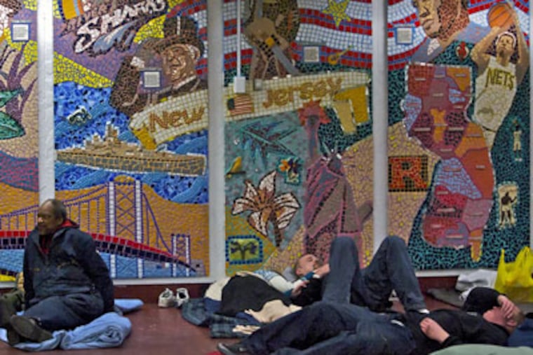 The "warming center" in the lobby of Camden County's administration building was used as an overnight shelter on Tuesday night during the latest "code blue" night. (John Costello / Staff Photographer)