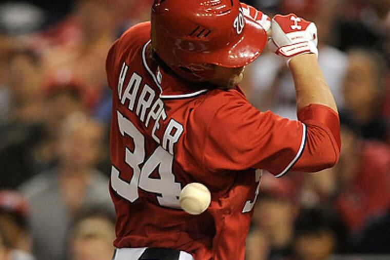 Cole Hamels intentionally hitting Bryce Harper with a pitch helped spice up things between the Phillies and Nationals. (Rich Lipski/AP)