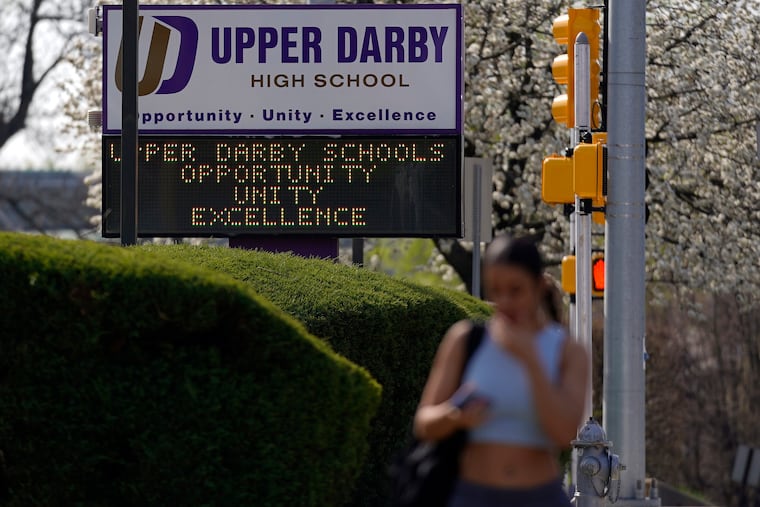A student walks to class at Upper Darby High School in this 2023 file photo. Upper Darby students were among those reportedly targeted with racist text messages.