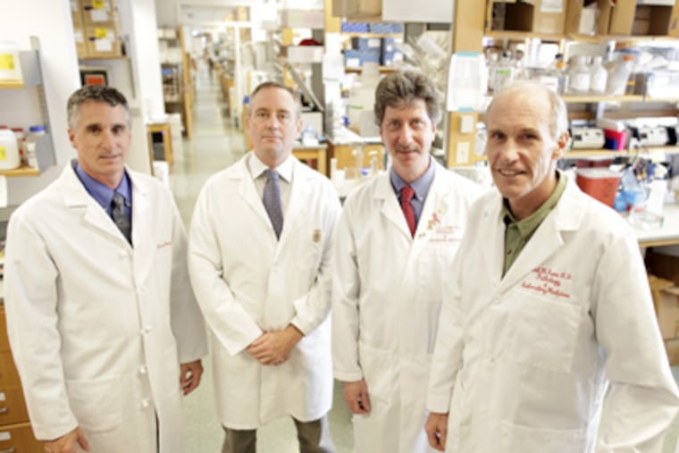The research team at Penn included (from left) David Porter, Michael Kalos, Bruce Levine, and Carl June, who led the work. (David Swanson / Staff Photographer)