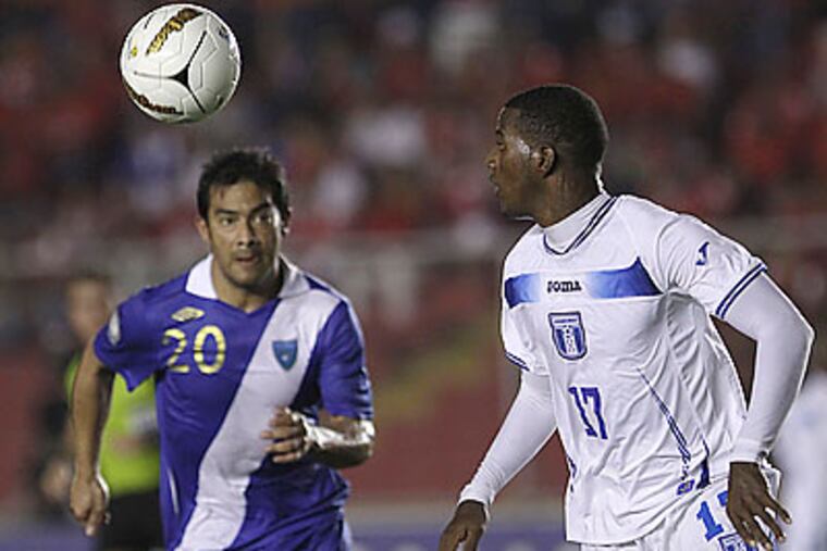 "I have always scored, and that has been my job," Carlos Ruiz (left) said. (Arnulfo Franco/AP file photo)