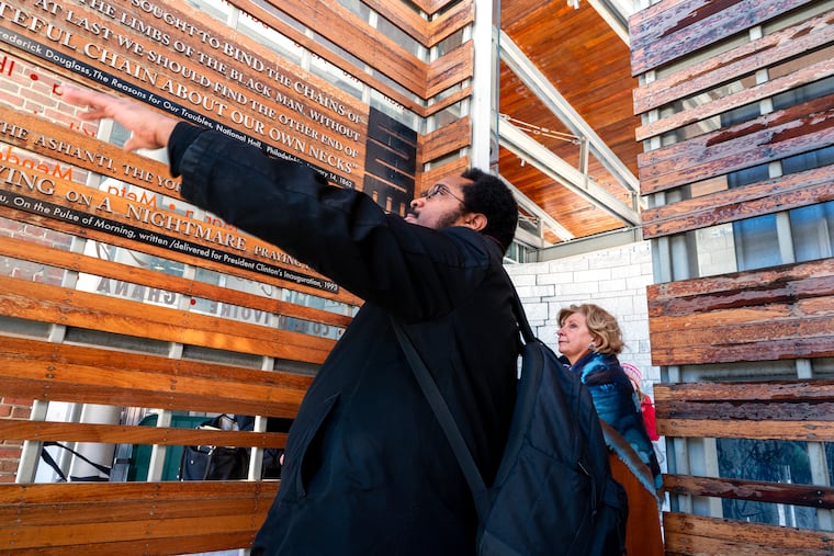 Mijuel Johnson (left) guides Judge Cynthia Rufe (right) as she visits the President's House in Independence National Historical Park on Monday, Feb. 2, 2026.