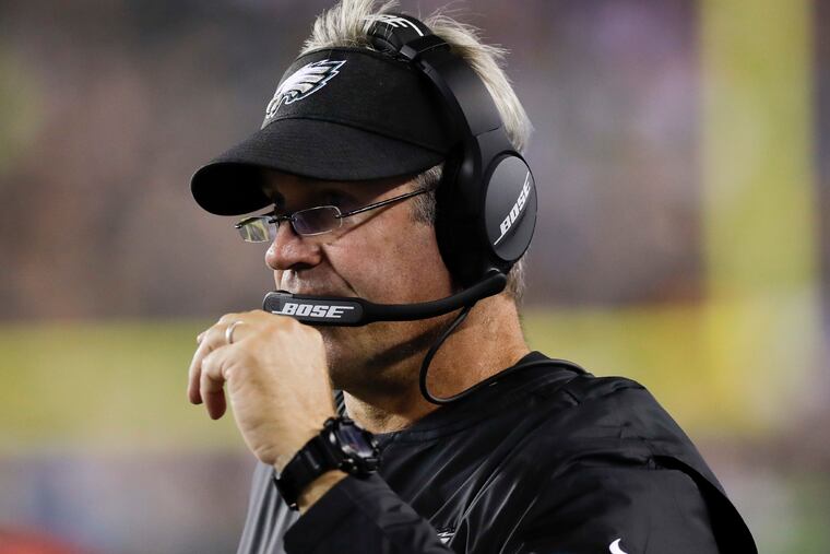 Eagles head coach Doug Pederson watches his team's preseason opener against the Tennessee Titans from the sideline during the third quarter.