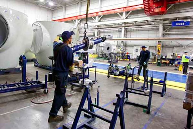 Andy Maykuth writes about Gamesa, the Spanish wind turbine maker headquartered in in Trevose who's Fairless Hills factory has no new orders on the books. The company is hoping for renewal of federal production tax credits. Here, at the Gamesa plant in Fairless Hills, workers assemble wind turbine components on the last job on the books. ( ED HILLE / Staff Photographer )