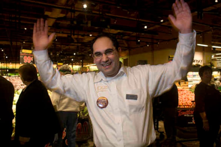 Shawn White of Havertown, team leader of the Pub, leads the Wegmans cheer.