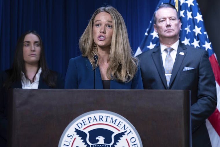 File photo of DHS Assistant Secretary for Public Affairs Tricia McLaughlin flanked by Deputy director of U.S. Immigration and Customs Enforcement Madison Sheahan, left, and Acting director of U.S. Immigration and Customs Enforcement Todd Lyons, during a news conference at ICE Headquarters, in Washington, May 21, 2025.