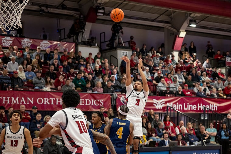 Saint Joseph’s Khaafiq Myers (3), goes for a shot against La Salle during the second half on Saturday.
