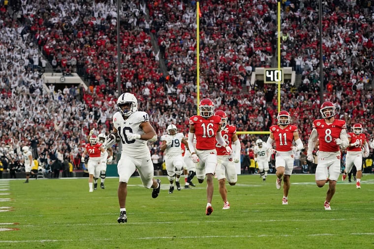 Penn State's Nicholas Singleton scores a touchdown on an 87-yard run against Utah in the Rose Bowl.