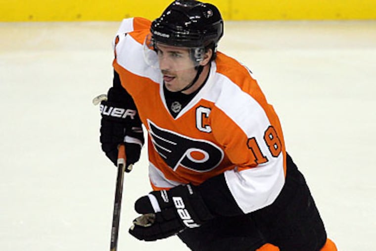 Flyers captain Mike Richards has stepped up his play recently. (Yong Kim/Staff file photo)