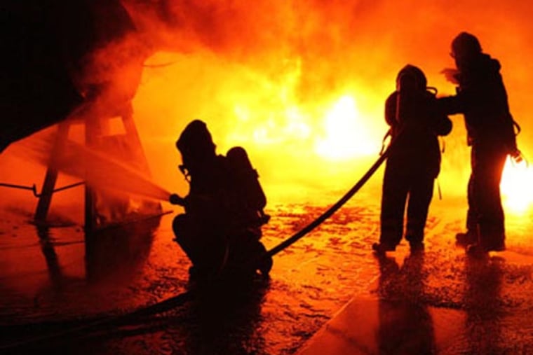 Neighbors said they believed arson was the cause of a fire early Sunday in Kensington. (File Photo)