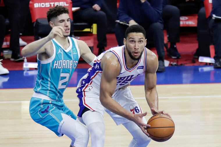 Sixers guard Ben Simmons works against Hornets guard LaMelo Ball on Saturday.