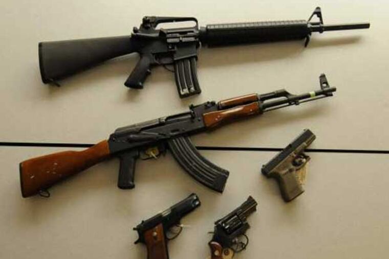Firearms from the Allegheny County Medical Examiner Office's crime lab. (AP photo)