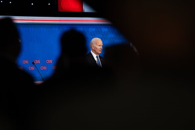 President Biden attends the first presidential debate hosted by CNN in Atlanta on Thursday. In Philadelphia, young voters texted friends as they watched, dark humor lacing their conversations.