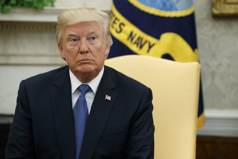 President Donald Trump listens as former Secretary of State Henry Kissinger speaks during a meeting in the Oval Office of the White House, Tuesday, Oct. 10, 2017, in Washington. (AP Photo/Evan Vucci)