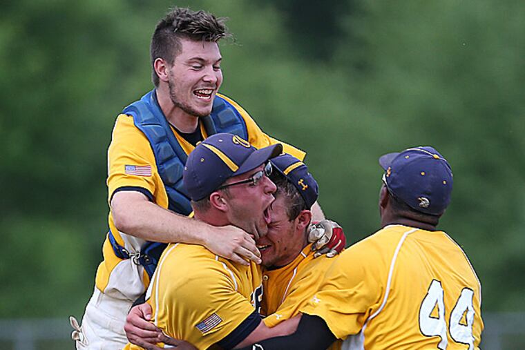 George Washington's Chase Alexande, Scott Siley, Roger Hanson and Ishmael Bracy celebrate. (David Maialetti/Staff Photographer )
