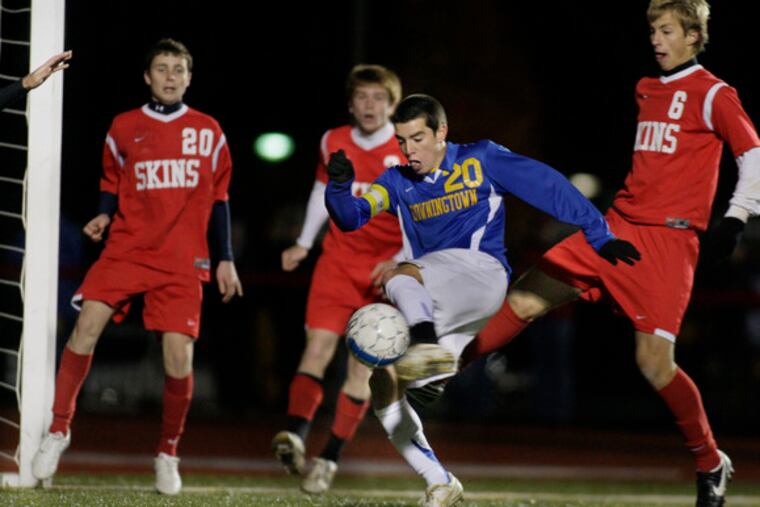 Downingtown West's Chris Harmon (20) is about to score the first of three goals during the Whippets' state semifinal win against Neshaminy. With him from left are Neshaminy's Sean Sheridan, Dan Kennedy and Kyle Soroka.