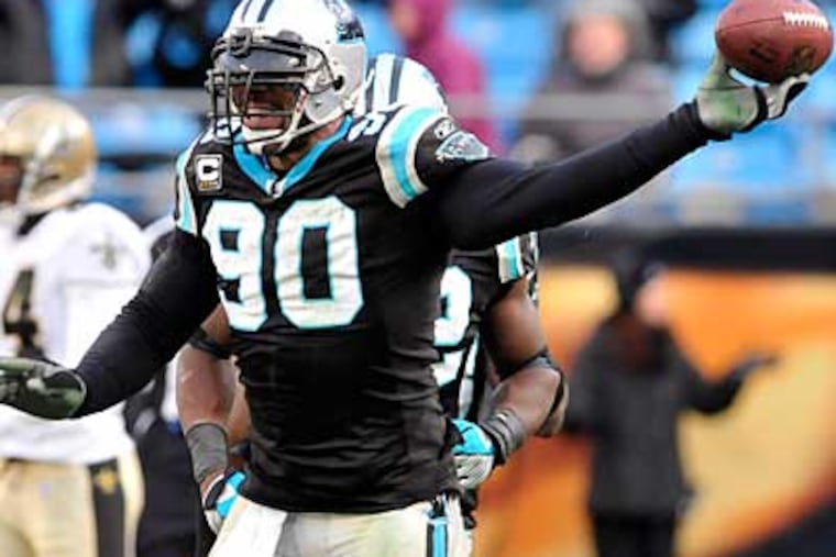 Carolina's Julius Peppers will soon be on the market. (AP Photo / Mike McCarn)