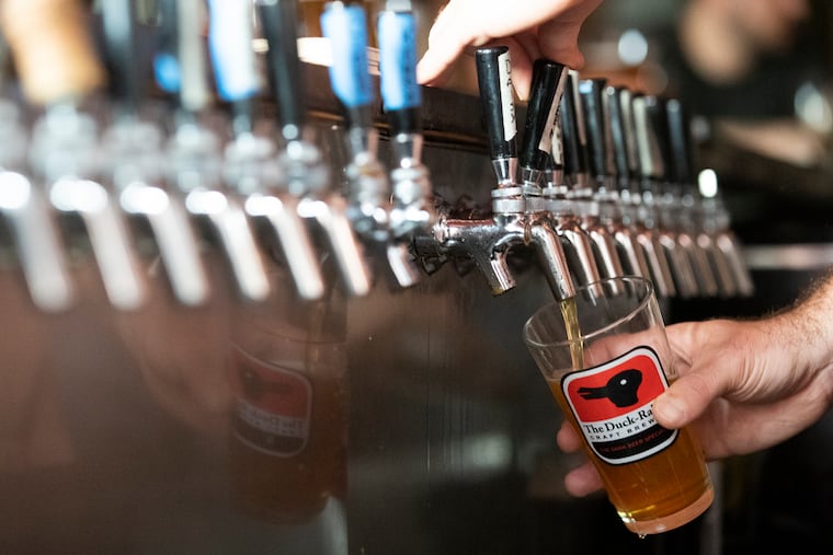 A beer is poured at the Fountain Porter at 1601 S. 10th St. in Philadelphia last August.