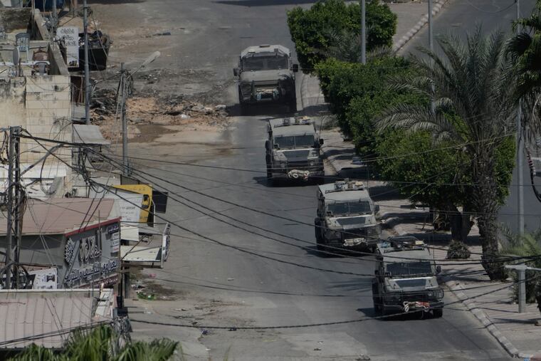 Israeli military vehicles maneuver during an operation in the West Bank city of Jenin on Thursday, Sept. 5, 2024.