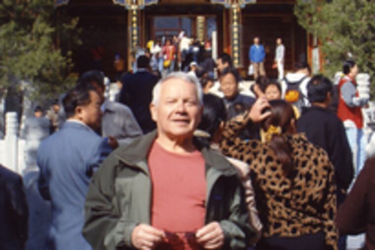 Lerner (above) poses in front of a pagoda he visited during his time in China. Below, Chinese students, part of Temple's Master of Laws program based at Tsinghua University, pose at the U.S. Supreme Court Building in Washington during a visit this summer.