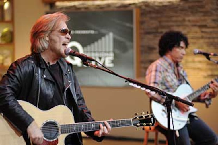 Daryl Hall and John Oates in a recent performance. They have had more than two dozen Top 40 hits and gained fans among their idols.