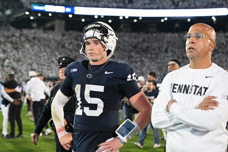 Penn State quarterback Drew Allar (15) and head coach James Franklin react after losing to Oregon in the second overtime of their game last Saturday.