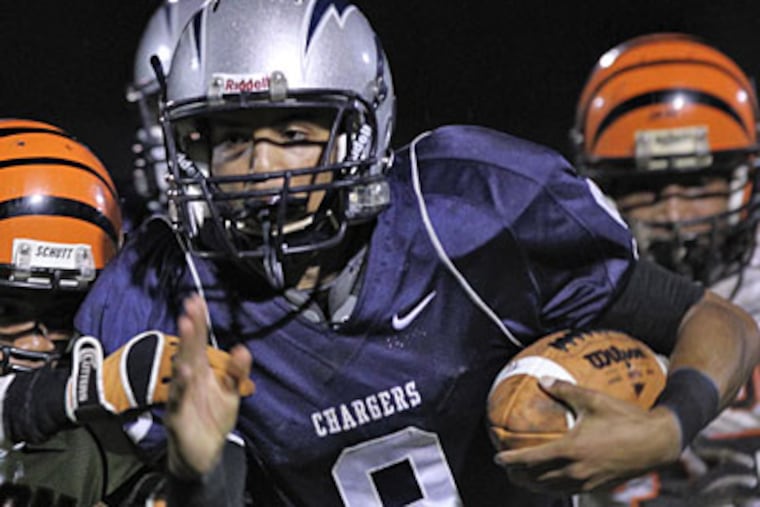 Timber Creek quarterback Calvin Lowe scored one passing and one rushing touchdown. (David M Warren/Staff Photographer)