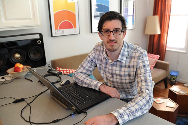Ben Novack, 29, a software engineer, in his South Philadelphia trinity Jan. 22, 2014. Novack is a single Millennial in the city but will likely leave when he gets married and starts a family. (CLEM MURRAY/Staff Photographer)