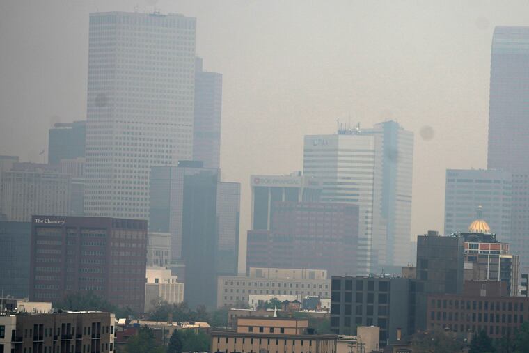 The Denver skyline is obscured by smoke from wildfires in Alberta, Candada. The smoke over Philly hasn't been nearly this extreme.