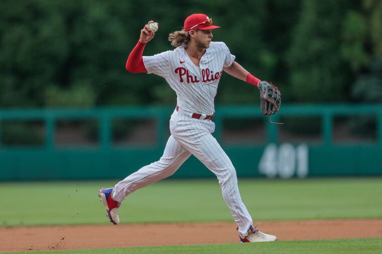 Phillies third baseman Alec Bohm throws to first during the first inning.