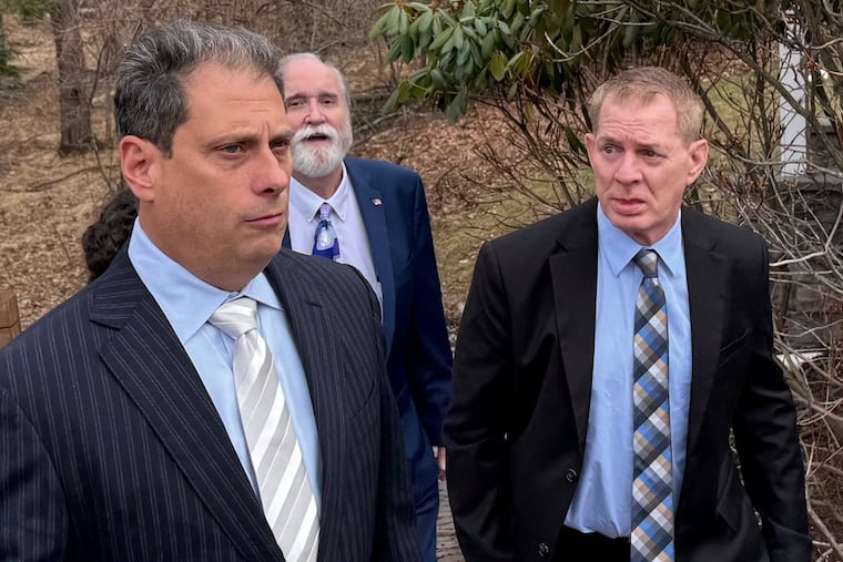 Lenny Dykstra (right) leaving a courtroom in Hawley, Pa., after waiving his preliminary hearing on two misdemeanor drug charges. He appeared with defense attorneys Matthew Blit (left) and Thomas Mincer.