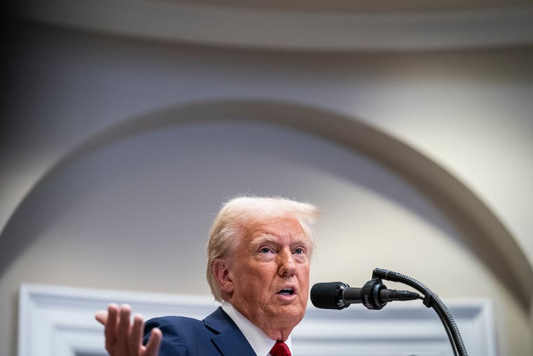 President Donald Trump speaks with reporters on Jan. 21.