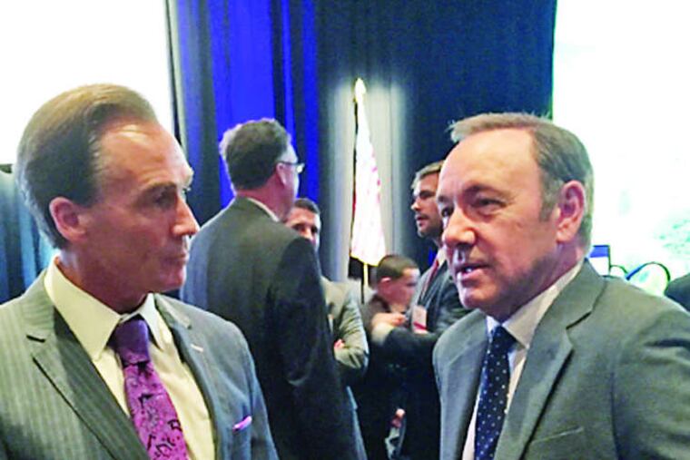 Lt. Gov. Mike Stack (left) and Kevin Spacey discuss acting, politics - and murder? - Monday night in Hershey.