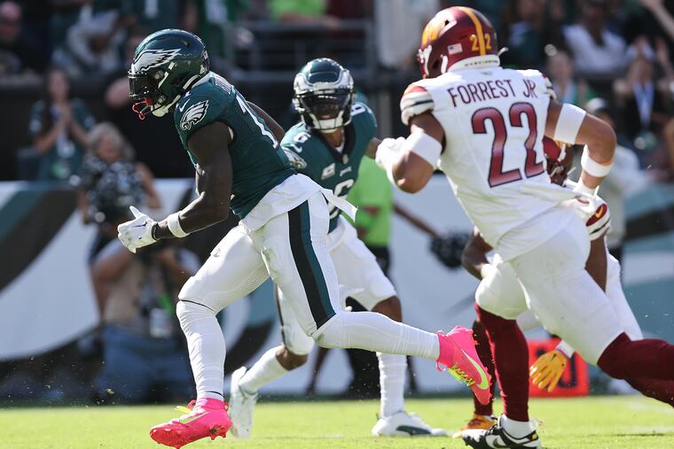 Eagles wide receiver A.J. Brown finishes off a 59-yard touchdown against the Commanders.