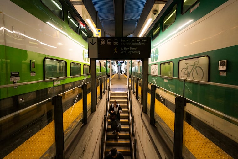 Commuters arrive at Union Station on a GO Train as a national rail shutdown causes delays in Toronto on Thursday, Aug. 22, 2024.