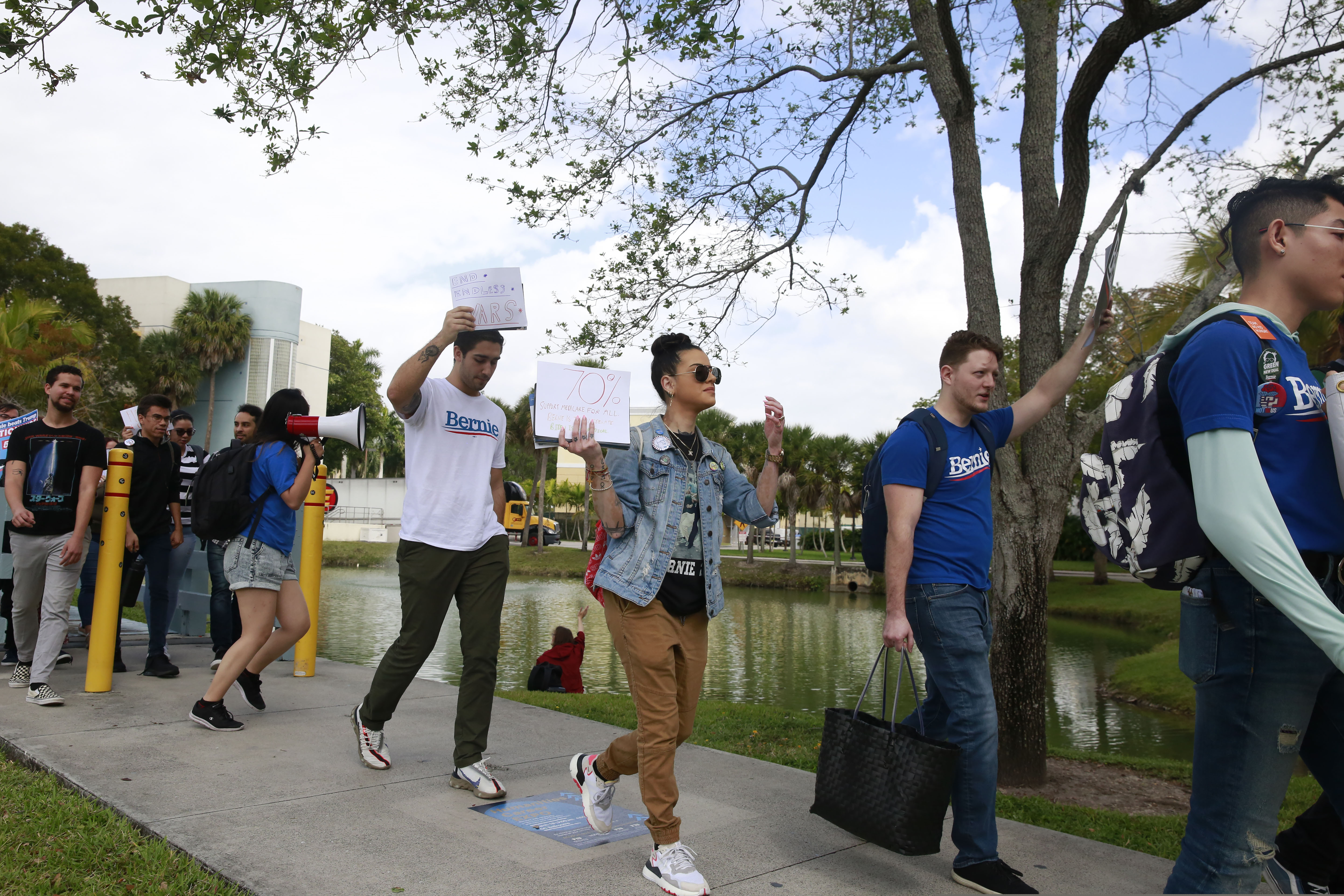 Students chant during the Bernie 2020 March to Early Vote at Florida International University to on Wednesday, March 11, 2020, in Miami.