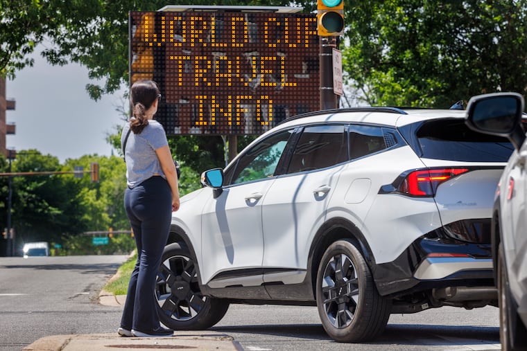 Electronic traffic information sign at Spring Garden and N. 21st Street informing people in town for World Cup on where to find information, Tuesday, June 9, 2026.