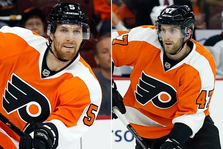 Braydon Coburn and Andrew MacDonald. (Yong Kim/Staff Photographer)