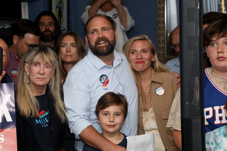 Zack Mullock, with his wife, Justine, and family and friends, prepares to speak at the Chalfonte Hotel in Cape May on Tuesday night after winning the Democratic primary election in New Jersey's 2nd Congressional District. Mullock will face Republican incumbent Jeff Van Drew in November.
