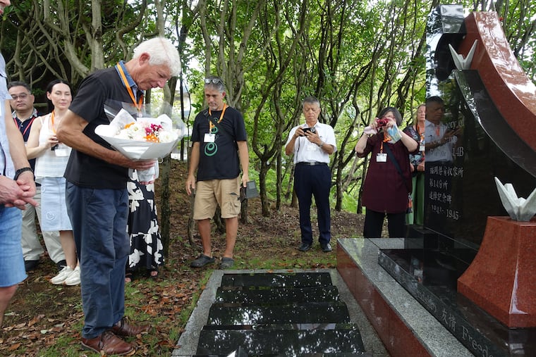 Relatives of former Dutch POWs pay tribute on Sept. 12, 2025, at a monument dedicated to the victims of prison abuse and the atomic bombing of Nagasaki.