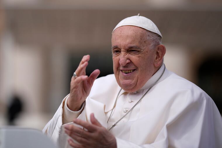 Pope Francis waves as he leaves following his weekly general audience in St. Peter's Square at The Vatican on Wednesday, April 10, 2024.