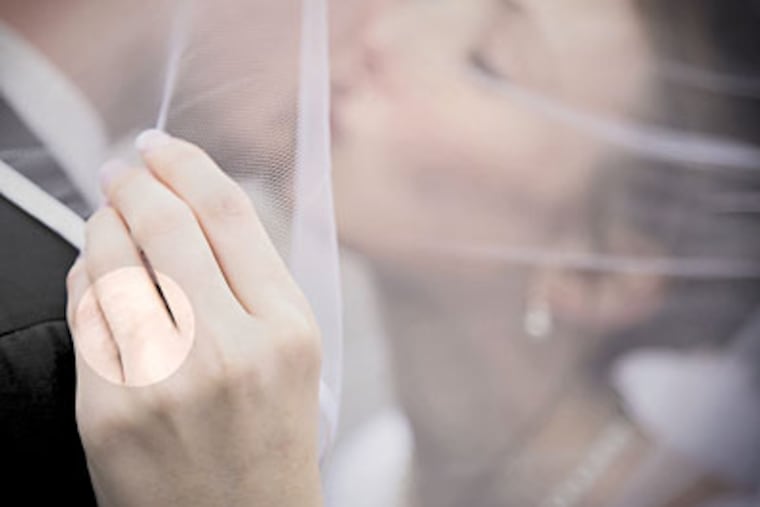 Marrying couples increasingly are doing without wedding rings or bands. includes the band. Some lament the loss of a symbol and the cultural about-face. (Staff photo illustration)