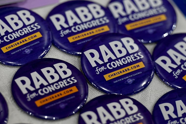 Campaign buttons for State Rep. Chris Rabb, a Democratic candidate running to represent Philadelphia's Third Congressional District.